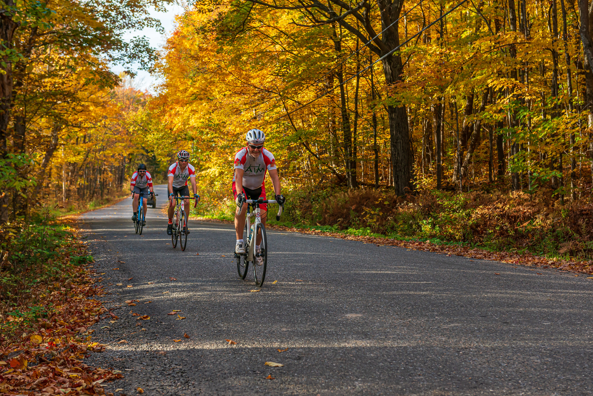 3 AIM Cyclists in the Fall 
